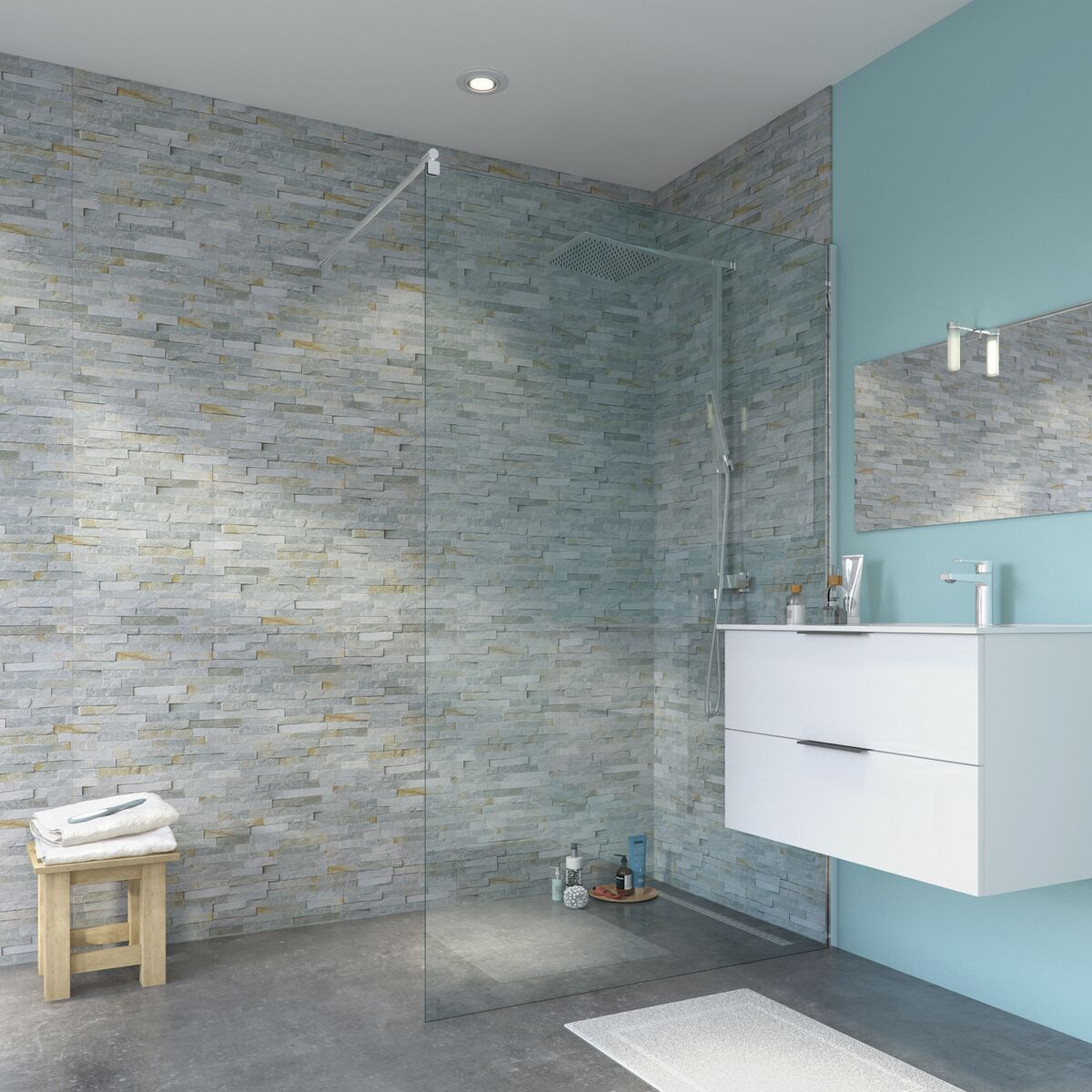 Shower stall and bathroom sink with angelo stone wall panel backdrop.
